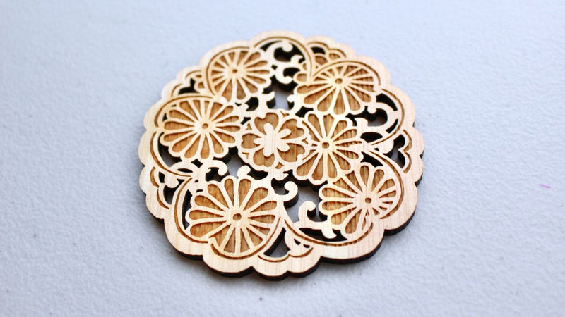 Wooden coaster (chrysanthemum on cherry blossom) created from a Kyoto Yuzen design