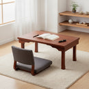 Japanese woodworking low desk in dark brown with floor chair, open book on top | Nigatsudo Desk, Ominato Bunkichi Shoten