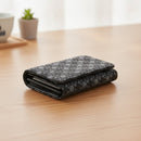 [WALLET] BUNDLE WALLET D ENGLISH ROSE (BLACK BASECOAT WITH GRAY LACQUER) | KOUSHU INDEN (LACQUERED DEERSKIN CRAFTS)| INDEN-YA｜使用イメージ（演出・着用）※手作りのため色・風合いは一点ごとに異なります