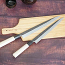 [KITCHEN (CHEF) KNIFE]  YANAGIBA KNIFE - KUROUCHI FINISH, PREMIUM HON-KASUMI, YASUGI WHITE STEEL NO. 2 (SINGLE-BEVEL), MAGNOLIA WOOD & WATER BUFFALO OCTAGONAL HANDLE, 270MM | SAKAI FORGED BLADES