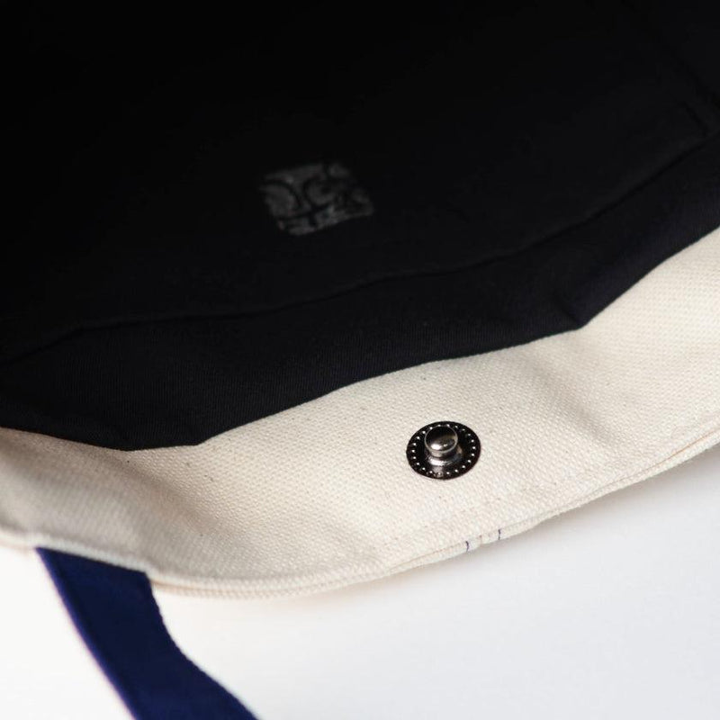 This ivory/navy is discontinued.